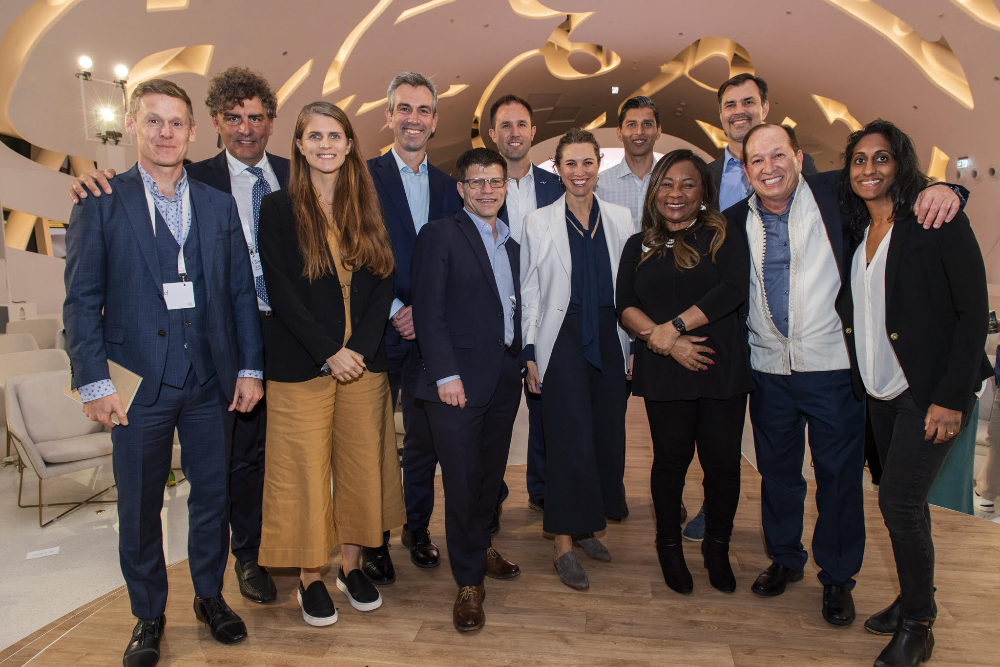 The Elemental team and portfolio company leaders smile together in Dubai.