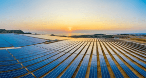 The sun sets over a solar farm